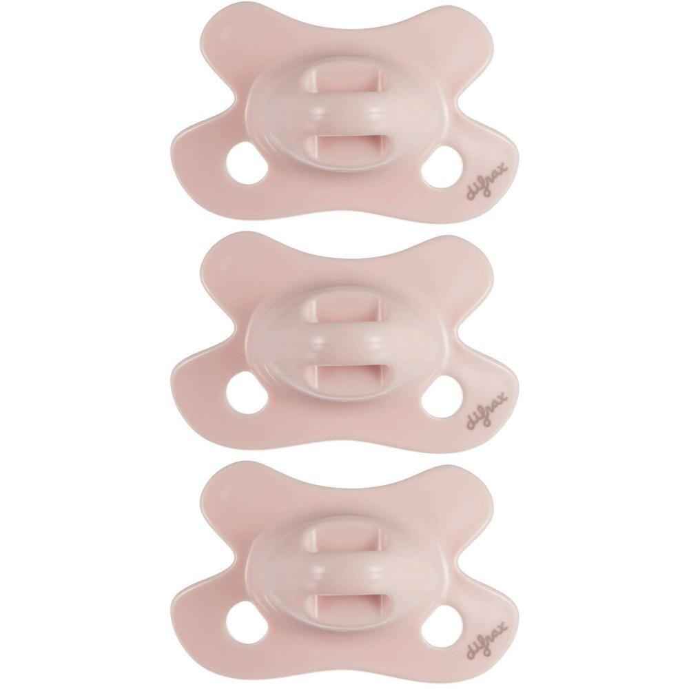 Trois sucettes Difrax roses avec tétine ovale et trous d'aération.