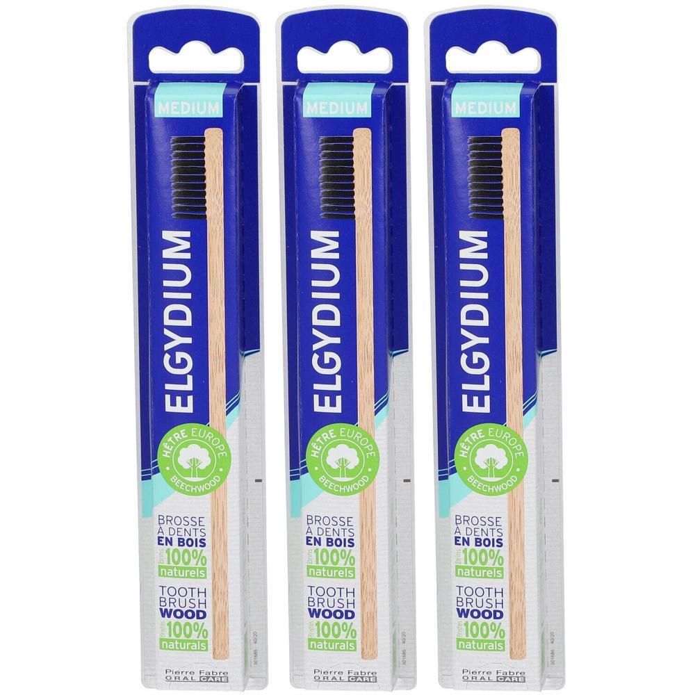 Trois brosses à dents Elgydium en bois, lot de 3, Medium, emballage éco-responsable.