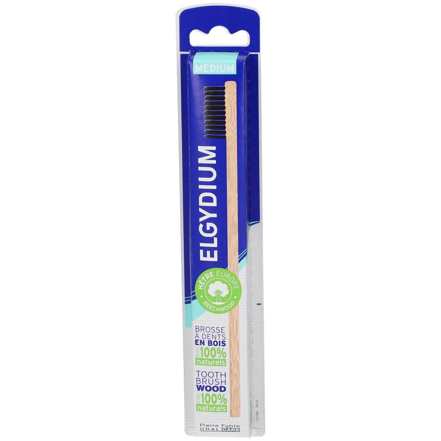 Brosse à dents en bois, poils medium, emballée.