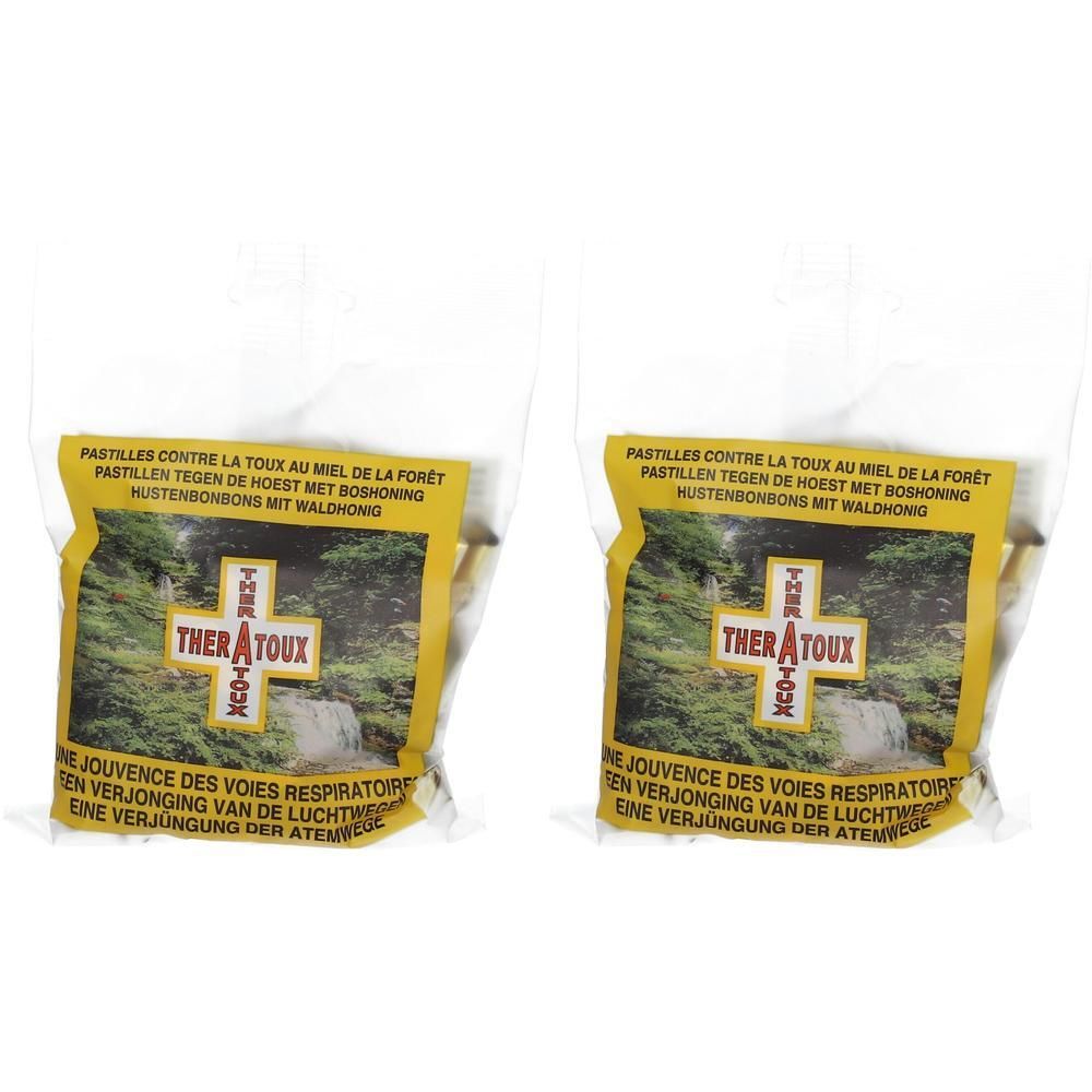 Twee pakjes hoestpastilles met bos honing. Geel etiket met natuurafbeelding en rood kruis.