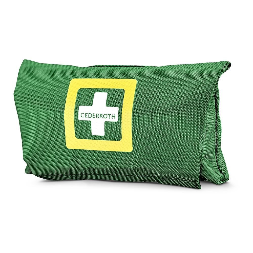 Pochette de premiers secours verte avec carré jaune et croix blanche, vue légèrement en biais.
