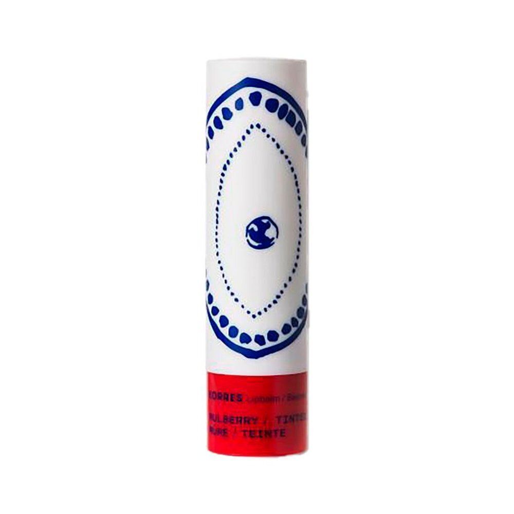 Un baume à lèvres Korres dans un tube blanc avec base rouge et décorations bleues.