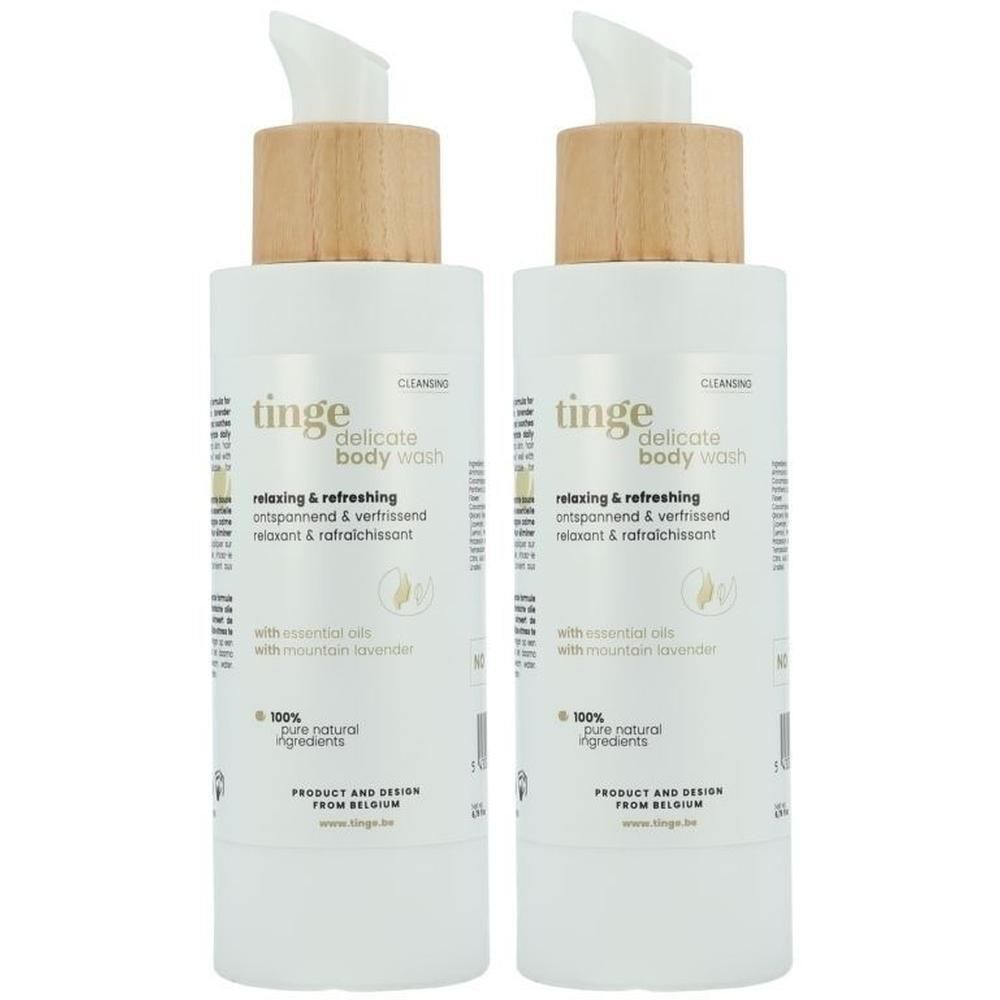 Deux flacons de Tinge Bodywash avec bouchon en bois et pompe.
