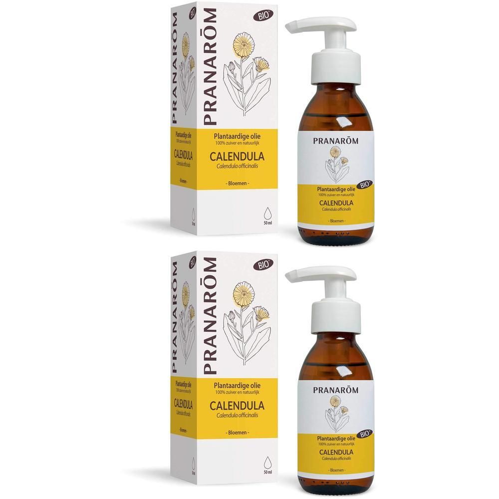 Twee flessen Pranarôm Calendula Bio plantaardige olie met pompdos en doosjes.