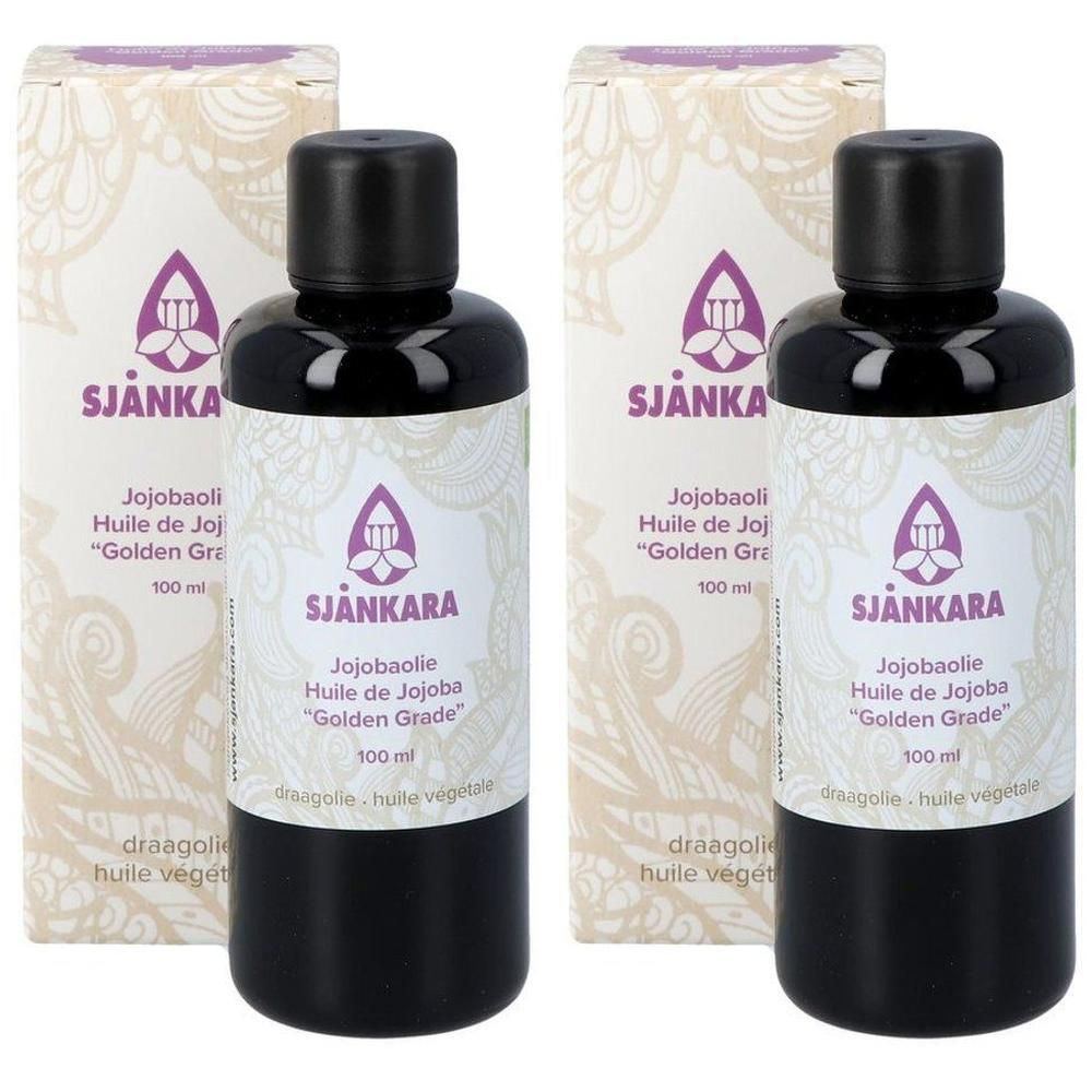 Deux flacons d'huile de jojoba Sjankara "Golden Grade" 100ml avec emballage.