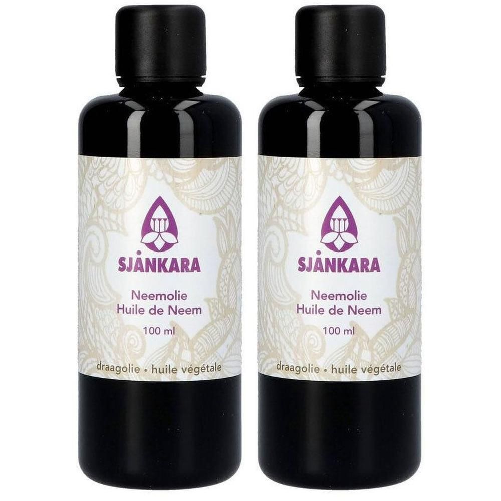Twee donkere flessen Sjankara Neemolie, 100 ml.