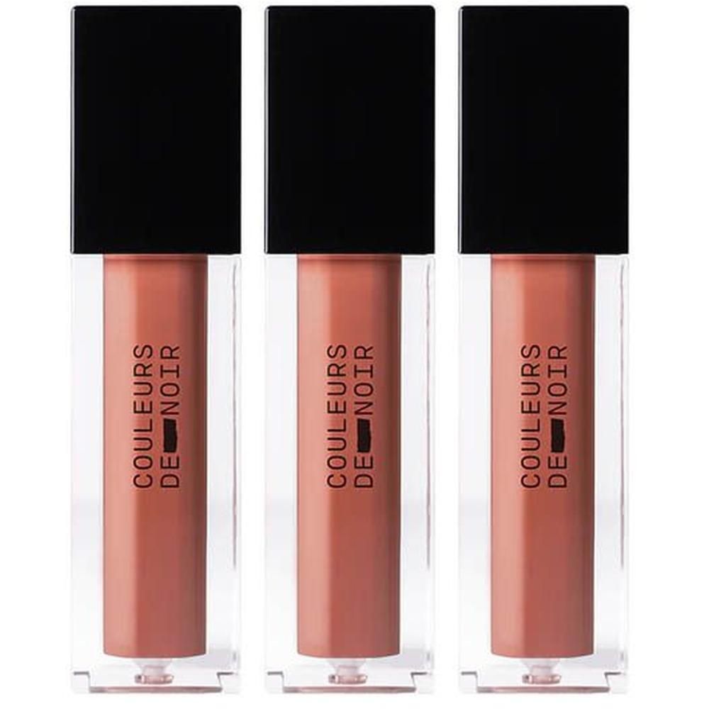 Drie flesjes Couleurs de Noir Instant Gloss Lip Maximizer in Dusky Pink.