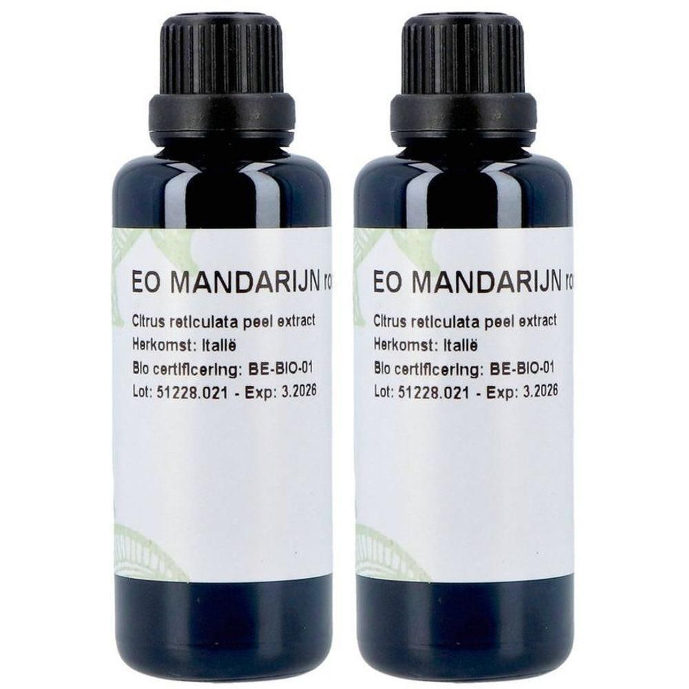 Deux flacons en verre foncé d'huile essentielle de mandarine. Étiquette avec 'EO MANDARIJN', 'Extrait de zeste de Citrus reticulata', 'Origine : Italie', 'Certification Bio : BE-BIO-01'.