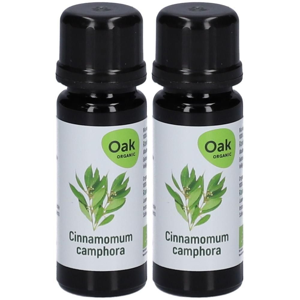 Deux flacons d'huile essentielle bio Oak Ravintsara, étiquette Cinnamomum camphora avec feuilles.