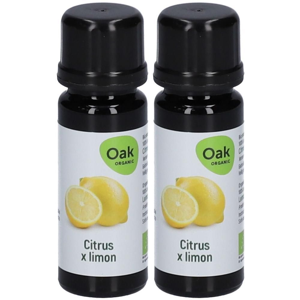 Twee flessen Oak Organic Citrus x Limon etherische olie met citroenafbeelding en biologisch keurmerk.