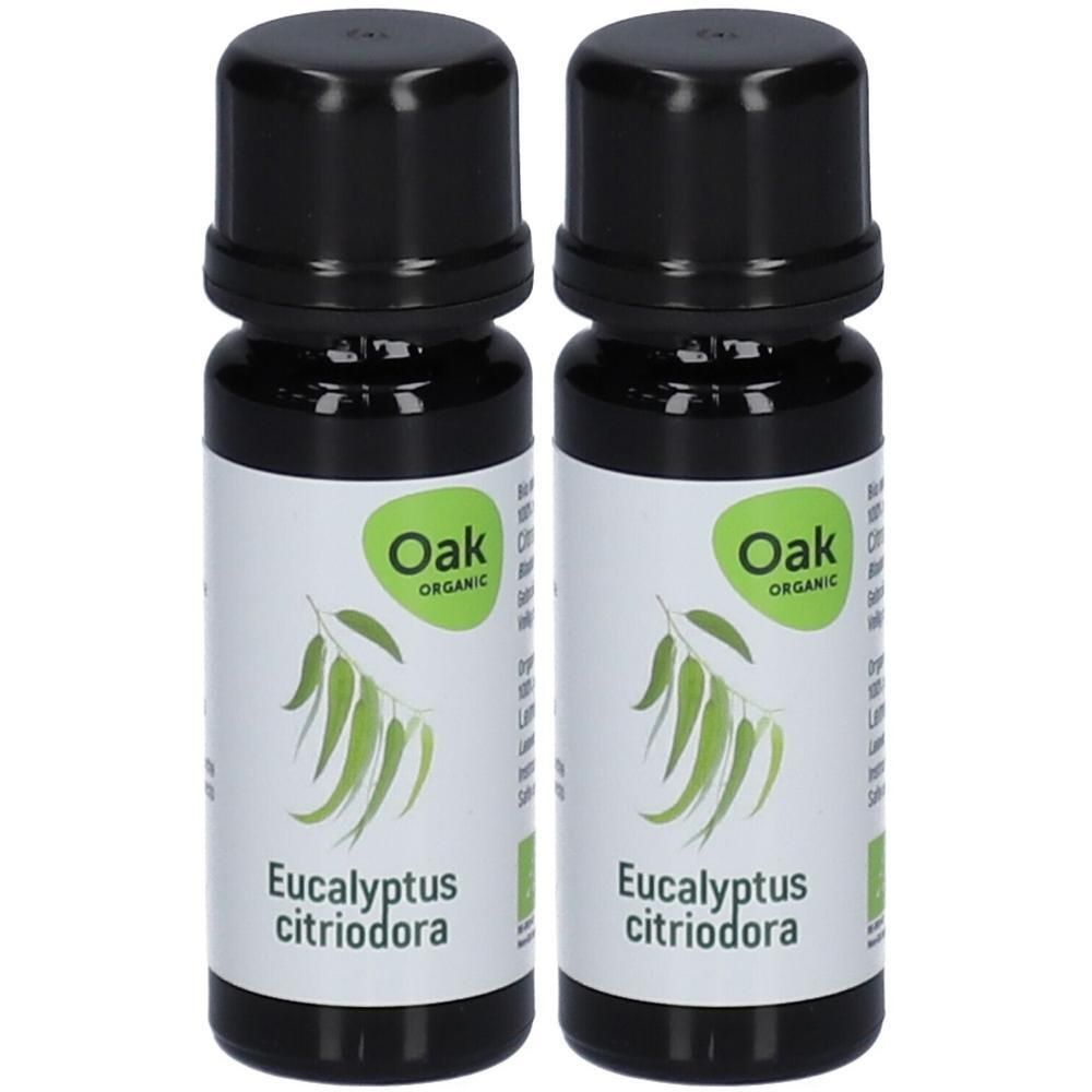 Deux flacons d'huile essentielle bio Eucalyptus Citriodora Oak avec bouchons noirs et étiquettes illustrant des feuilles d'eucalyptus.