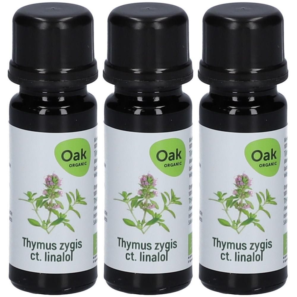 Trois flacons d'huile essentielle Oak Organic Thymus zygis ct. linalol avec illustration de plante.
