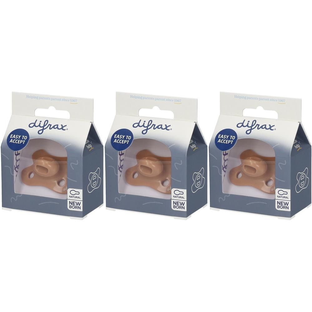 Drie Difrax fopspenen "Natural Caramel" voor pasgeborenen, elk in een verpakking.