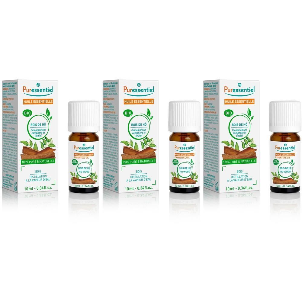 Vier flesjes Puressentiel Ho Hout etherische olie met verpakking.