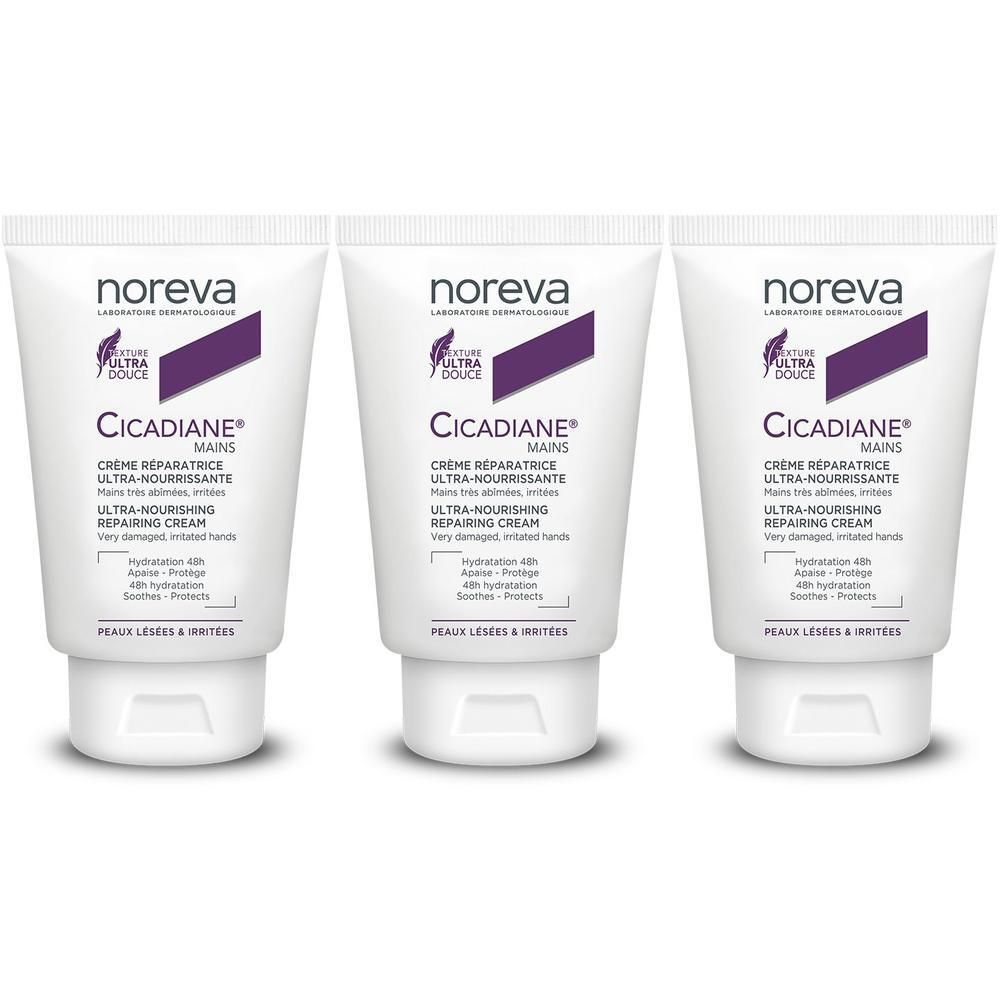 Trois tubes de crème pour les mains Noreva Cicadiane. Tubes blancs avec accents violets et informations produit.