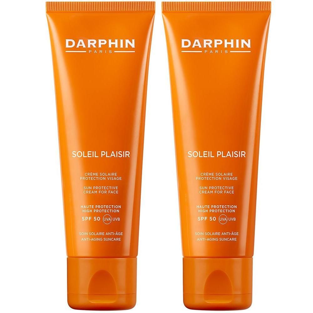 Deux tubes orange de crème solaire visage Darphin Soleil Plaisir SPF 50.