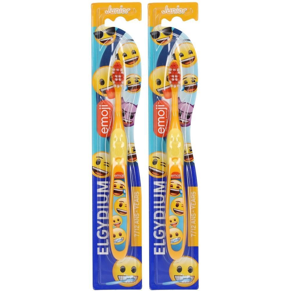 Twee gele Elgydium Junior Emoji tandenborstels voor kinderen van 7-12 jaar, zachte borstels.