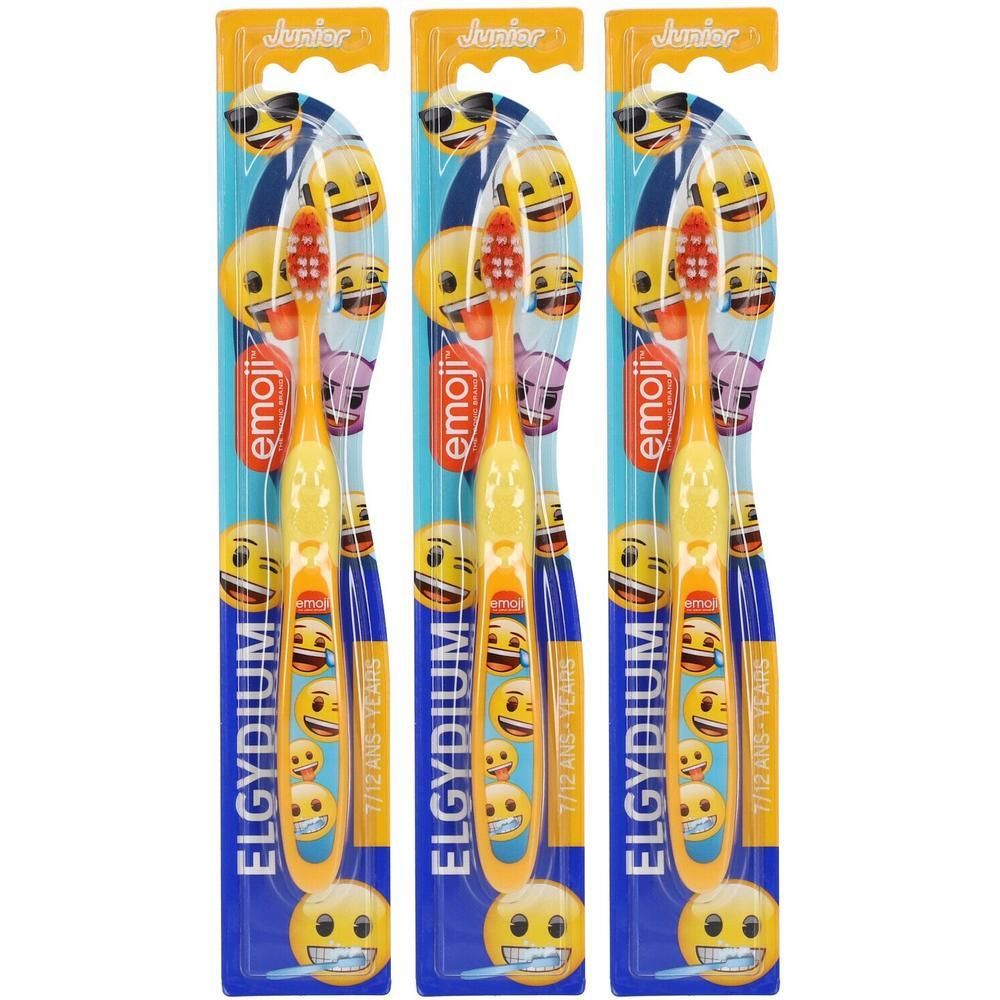 Drie gele tandenborstels voor kinderen met emoji-motief, verpakt.