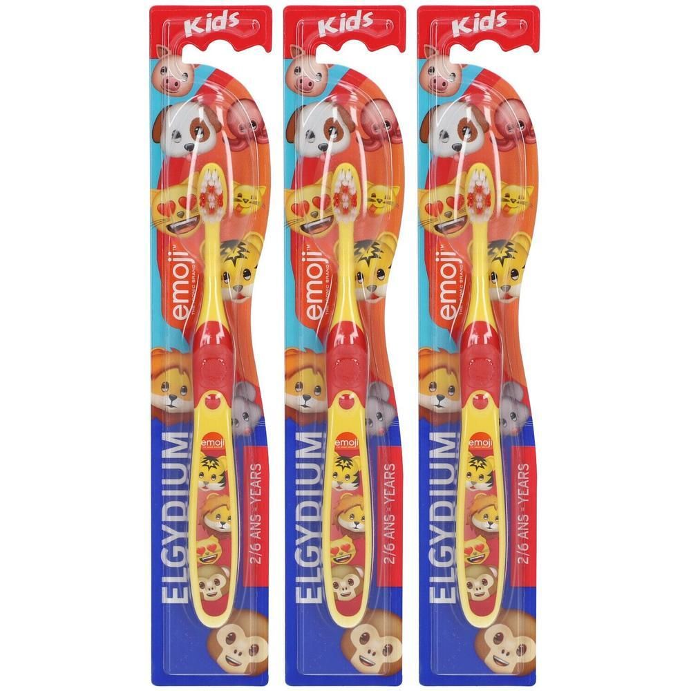 Trois brosses à dents Elgydium Kids Emoji pour enfants de 2 à 6 ans, rouges et jaunes.