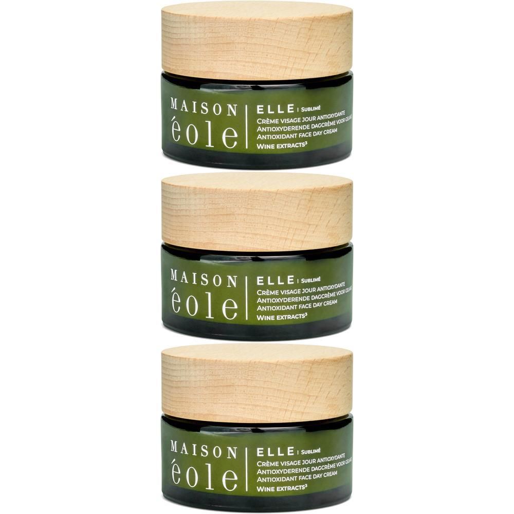 Drie Maison Éole potjes met houten deksels, groene potjes, gezichtscrème.