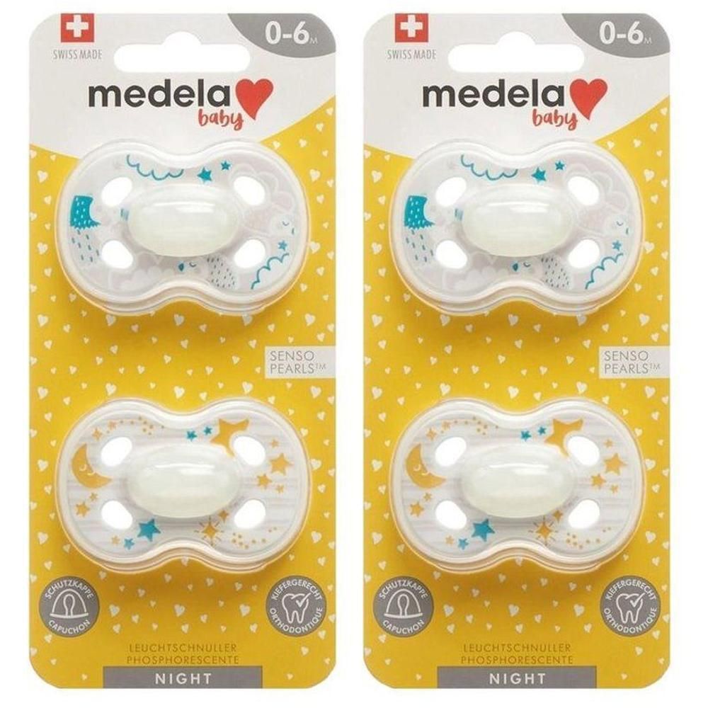 Deux sucettes Medela Baby NUIT 0-6 mois avec étoiles et lunes phosphorescentes. Orthodontiques.