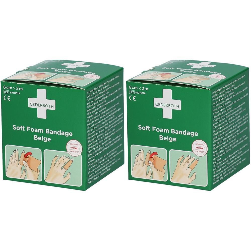 Twee pakken Cederroth Soft Foam Bandage Beige, 6 cm x 2 m. CE-markering en rood kruis zichtbaar.