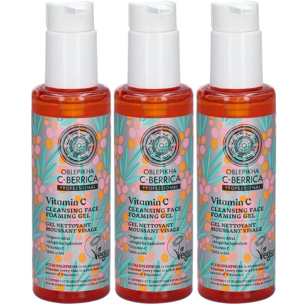 Drie flessen Oblepikha Vitamine C Cleansing Face Foaming Gel met pompdispenser. Oranje vloeistof, kleurrijke verpakking.