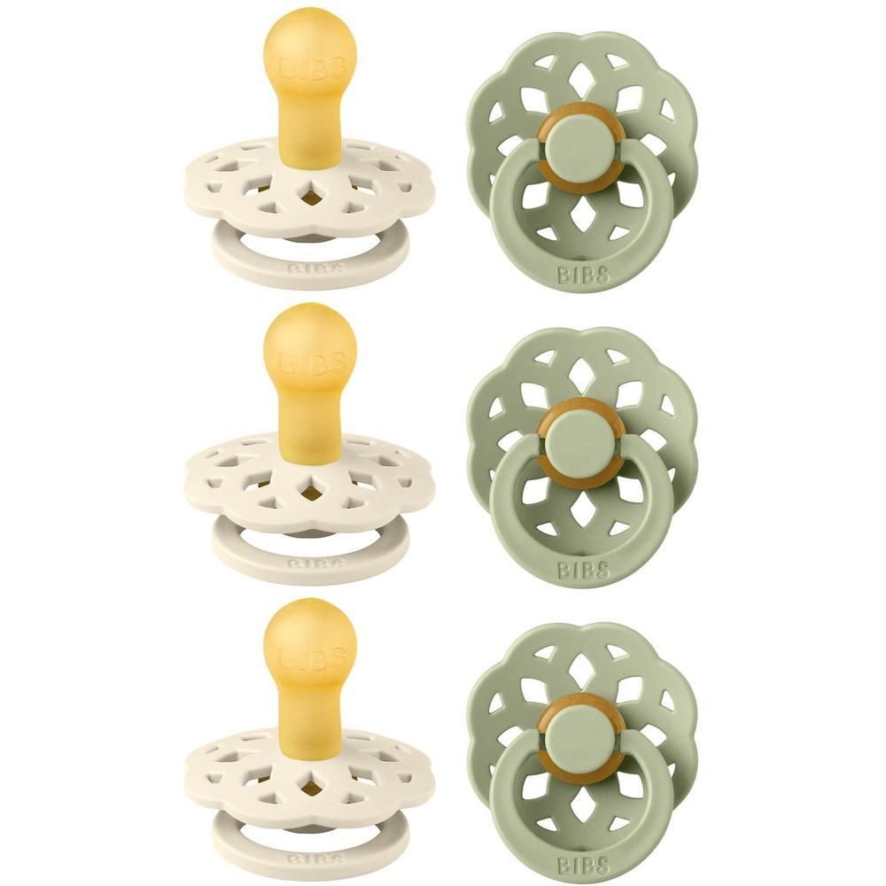 Drie BIBS speentjes in crème met gele speen en een decoratieve rand.