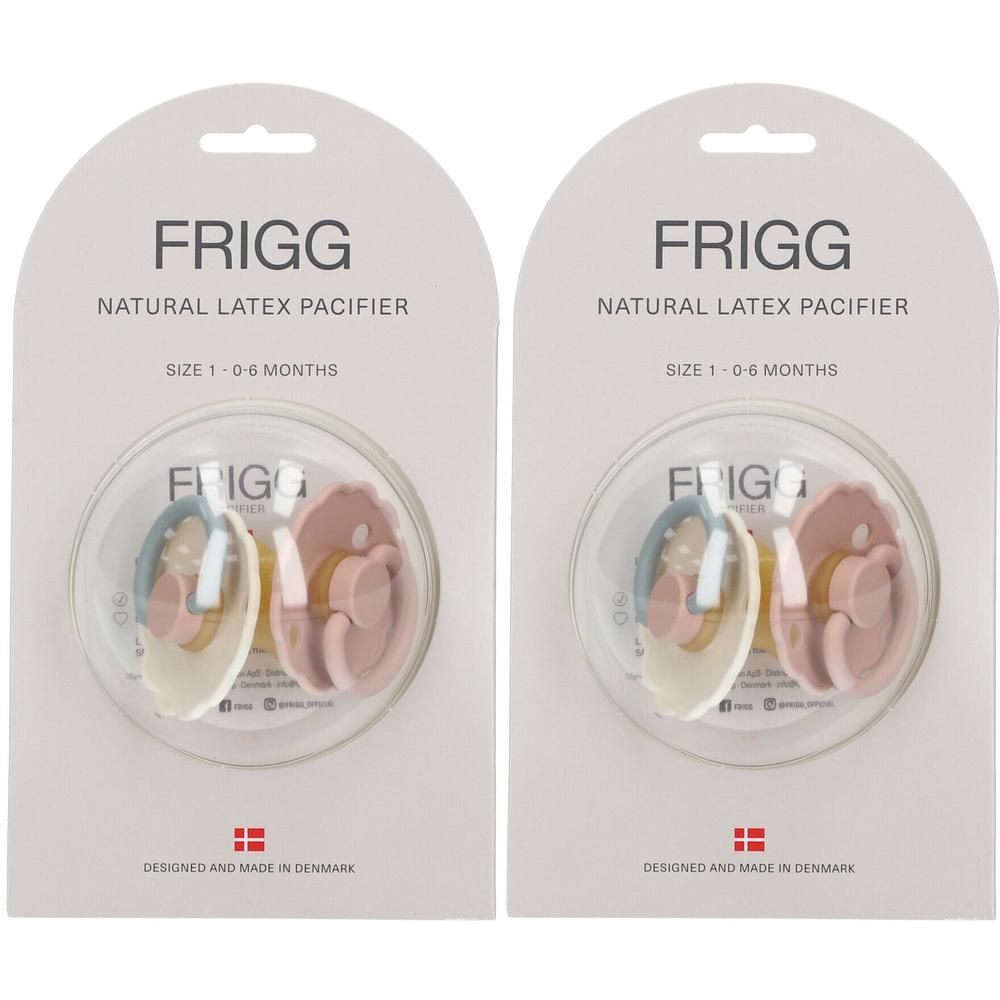 Twee FRIGG natuurrubberen spenen in roze en crème, maat 1 (0-6 maanden), in individuele verpakking.