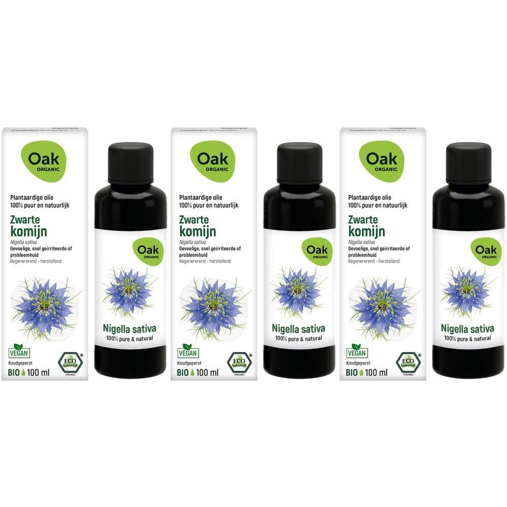 Oak Plantaardige olie Zwarte komijn: Vier flessen zwarte olie met doosjes. Nigella sativa bloem afgebeeld.