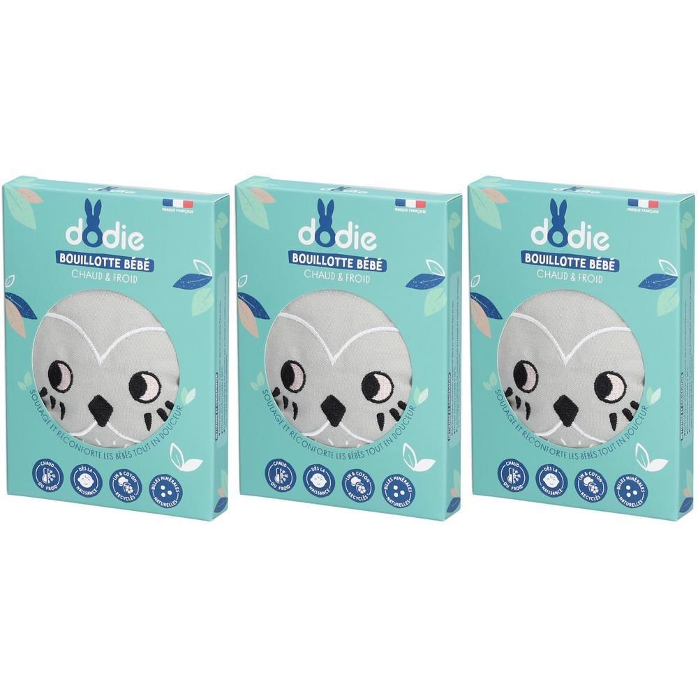 Drie Dodie babywarmwaterkruiken met uilmotief in turquoise verpakking.