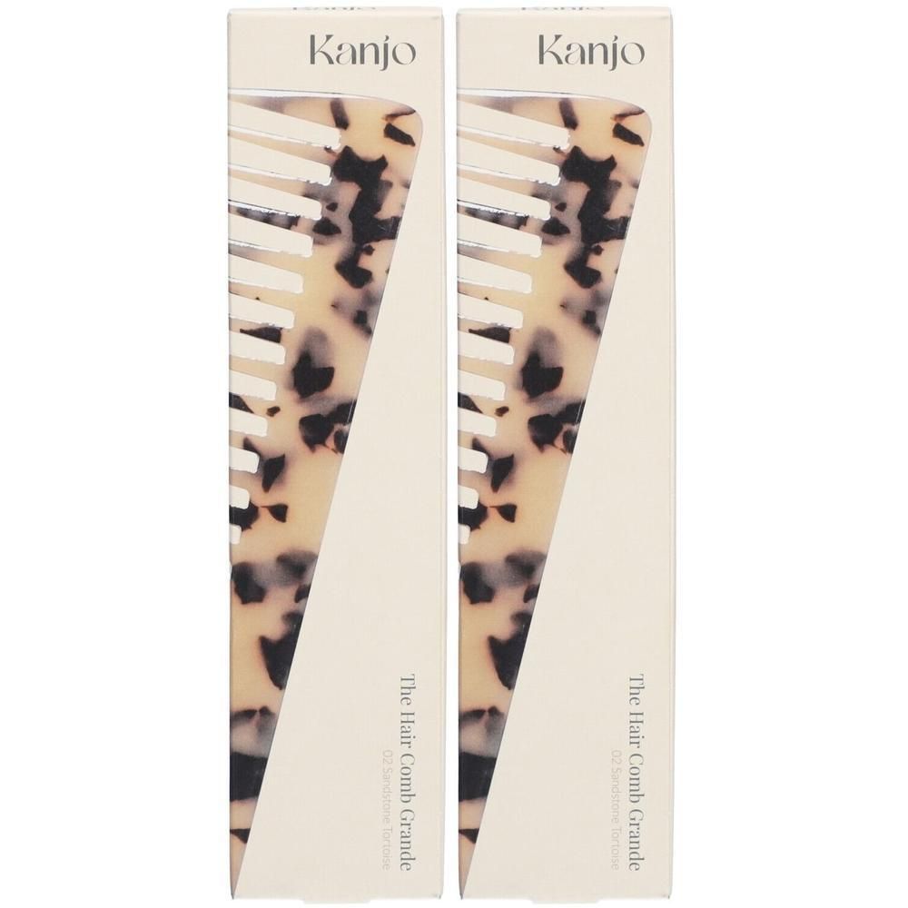 Deux peignes Kanjo Grande motif écaille de tortue sable, présentés dans leurs emballages.