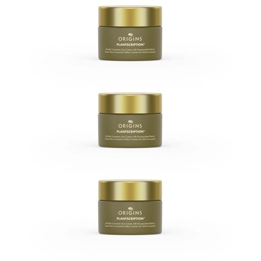 Trois pots de crème contour des yeux Origins Plantscription avec couvercles dorés.