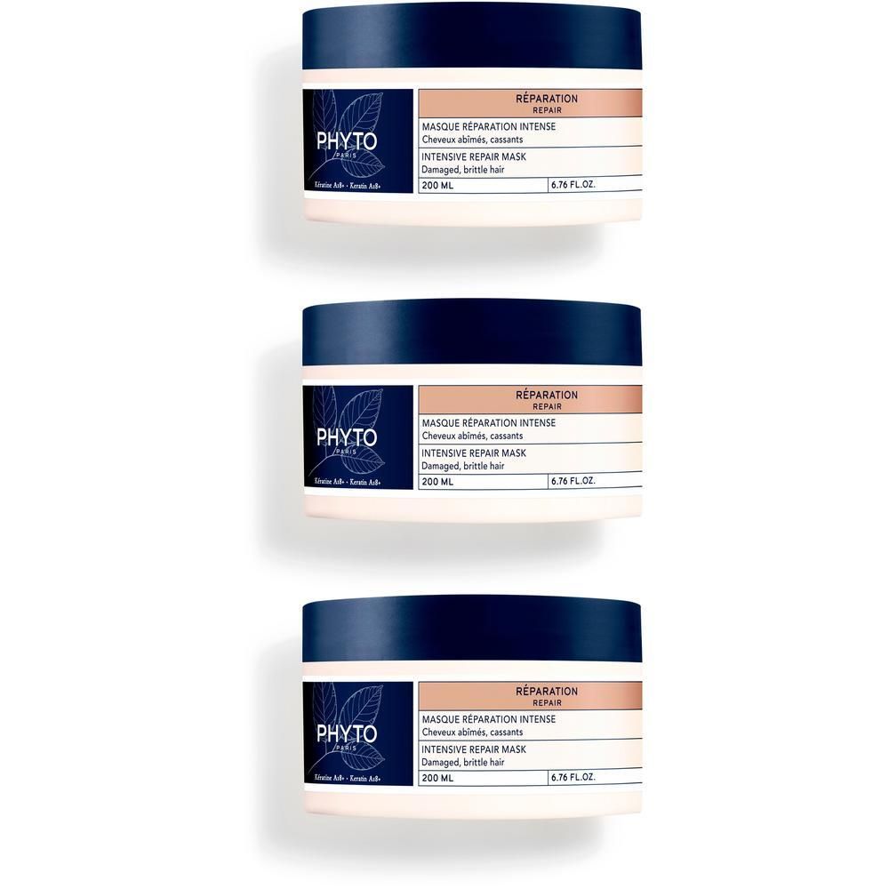 Trois pots Phyto Réparation Masque Réparation Intense avec couvercle bleu foncé et étiquette.