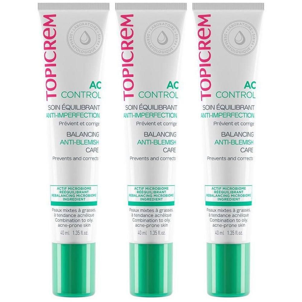 Trois tubes Topicrem AC Control Soin Équilibrant Anti-Imperfections avec bouchons verts.