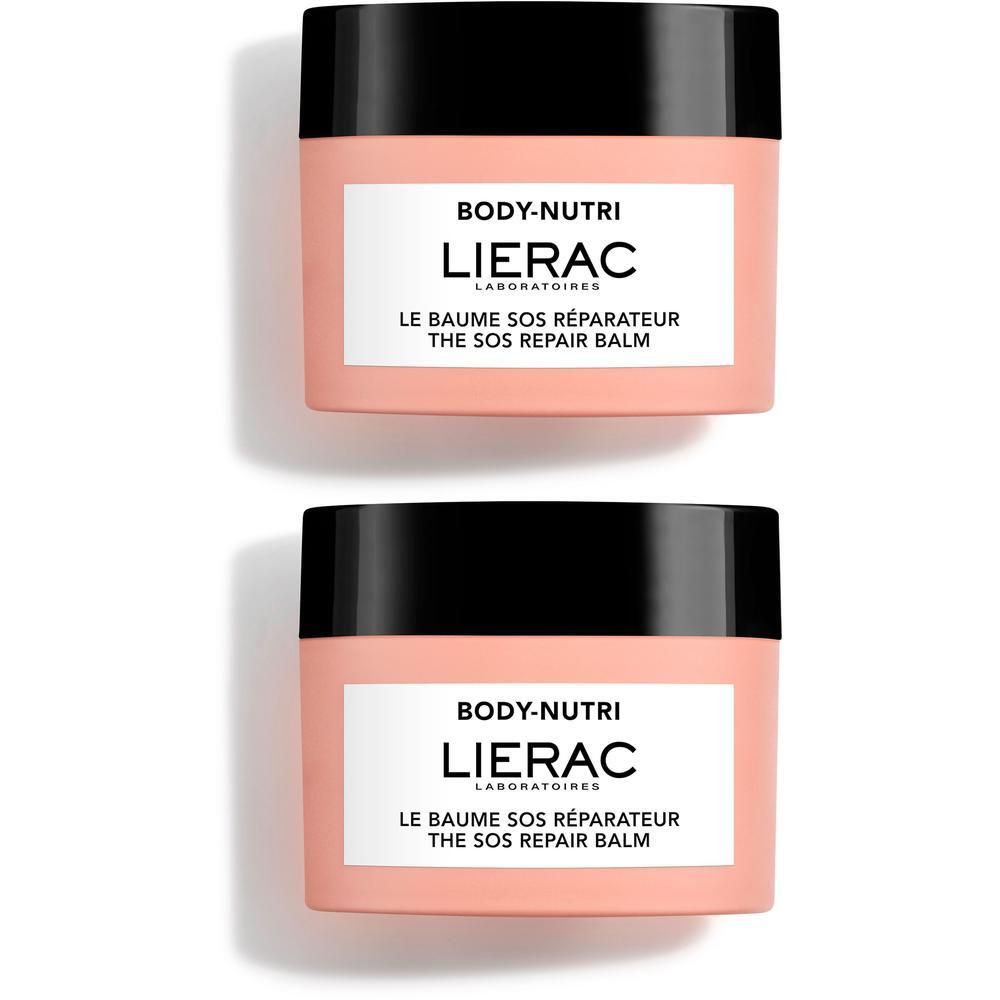 Deux baumes SOS Réparateur Lierac Body Nutri+ dans des pots roses avec couvercles noirs.
