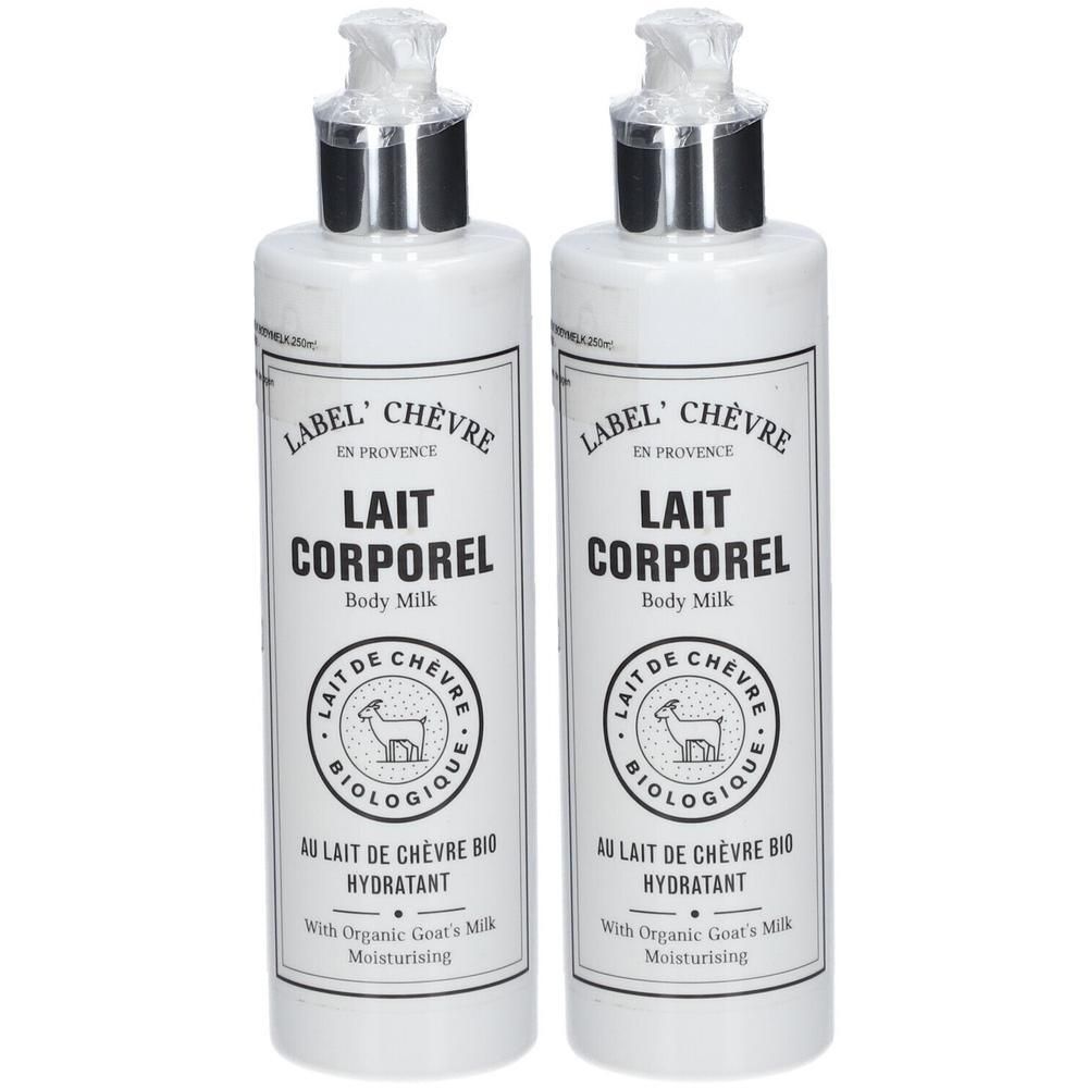Deux flacons blancs de lait corporel avec pompes. Étiquette avec motif de chèvre et texte.
