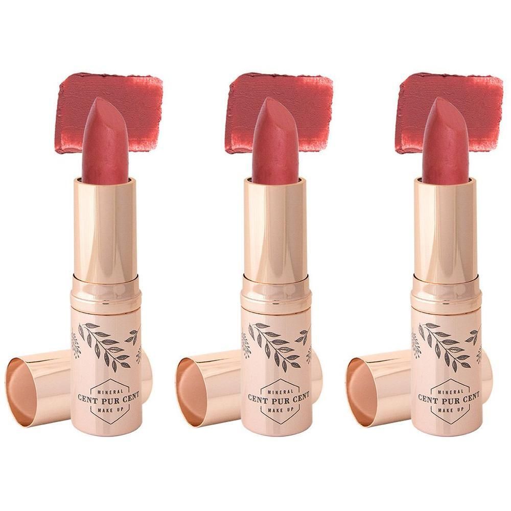 Drie minerale lipsticks in roze tinten met gouden houders en bladdesign. Kleurstalen boven elke lipstick.