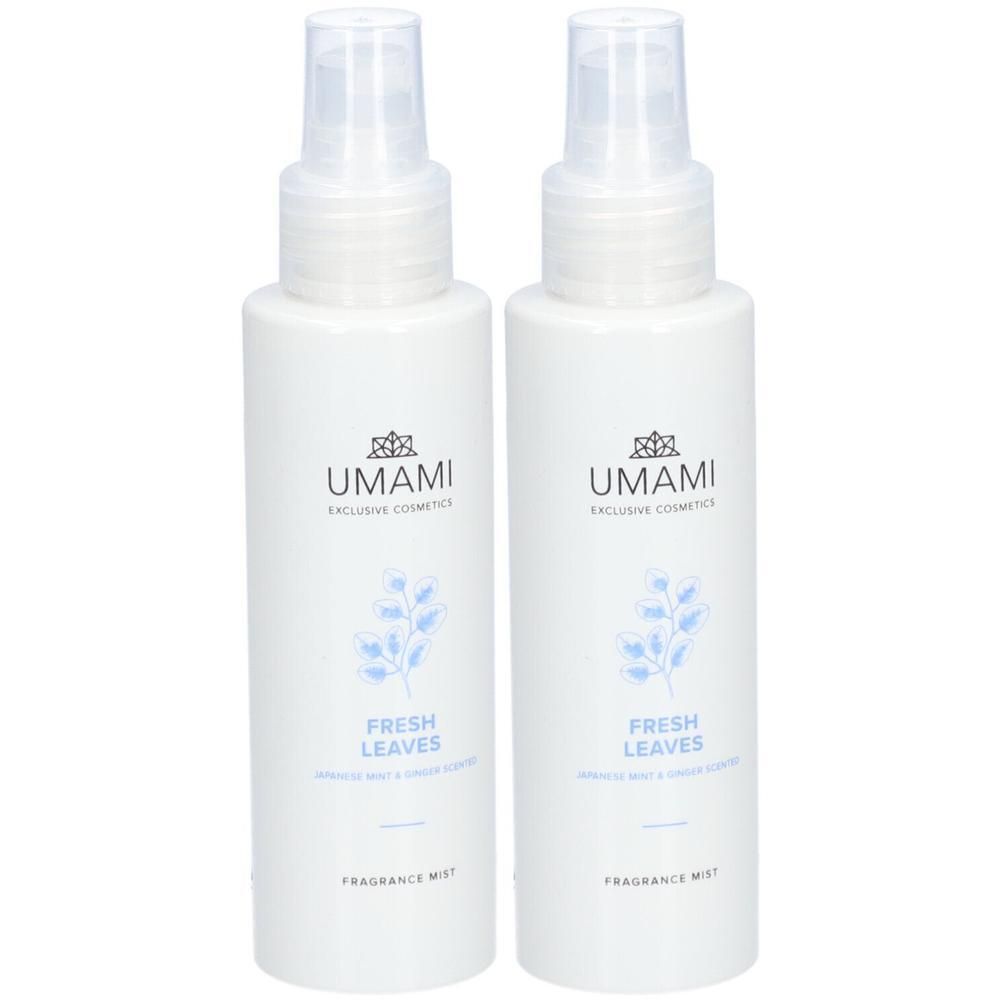 Twee witte spuitflessen met "Umami Fresh Leaves" geurnevel.