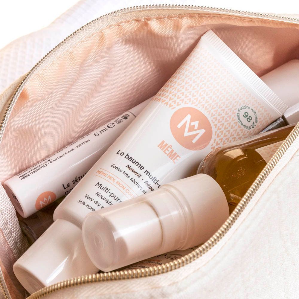 Meme Multi-Purpose Balm tube aangebracht op de huid.