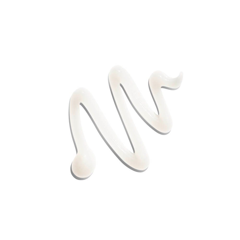 Een witte crème spiraal op een witte achtergrond.