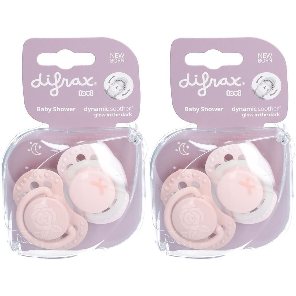 Deux sucettes Difrax Dynamic nouveau-né, roses, dans leur étui transparent.
