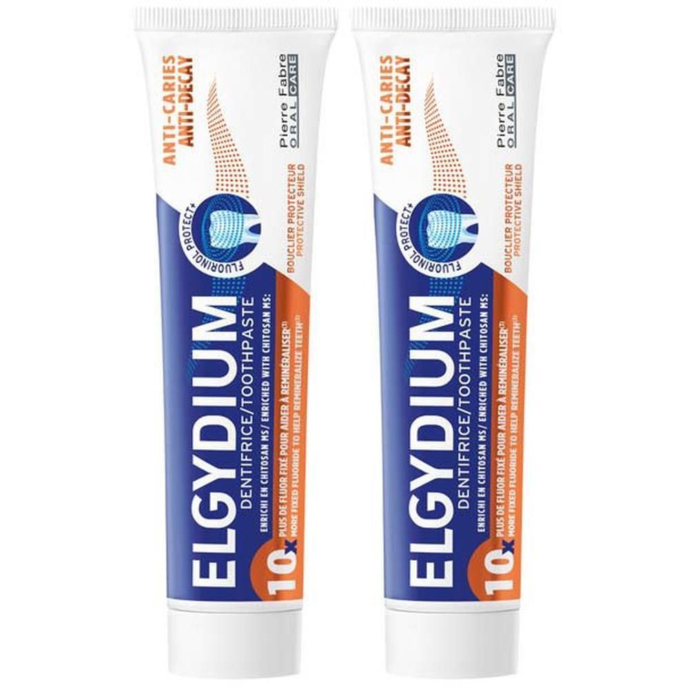 Deux tubes de dentifrice Elgydium protection caries.