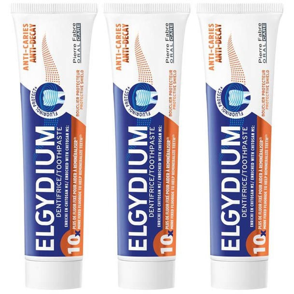 Trois tubes de dentifrice Elgydium Protection caries.