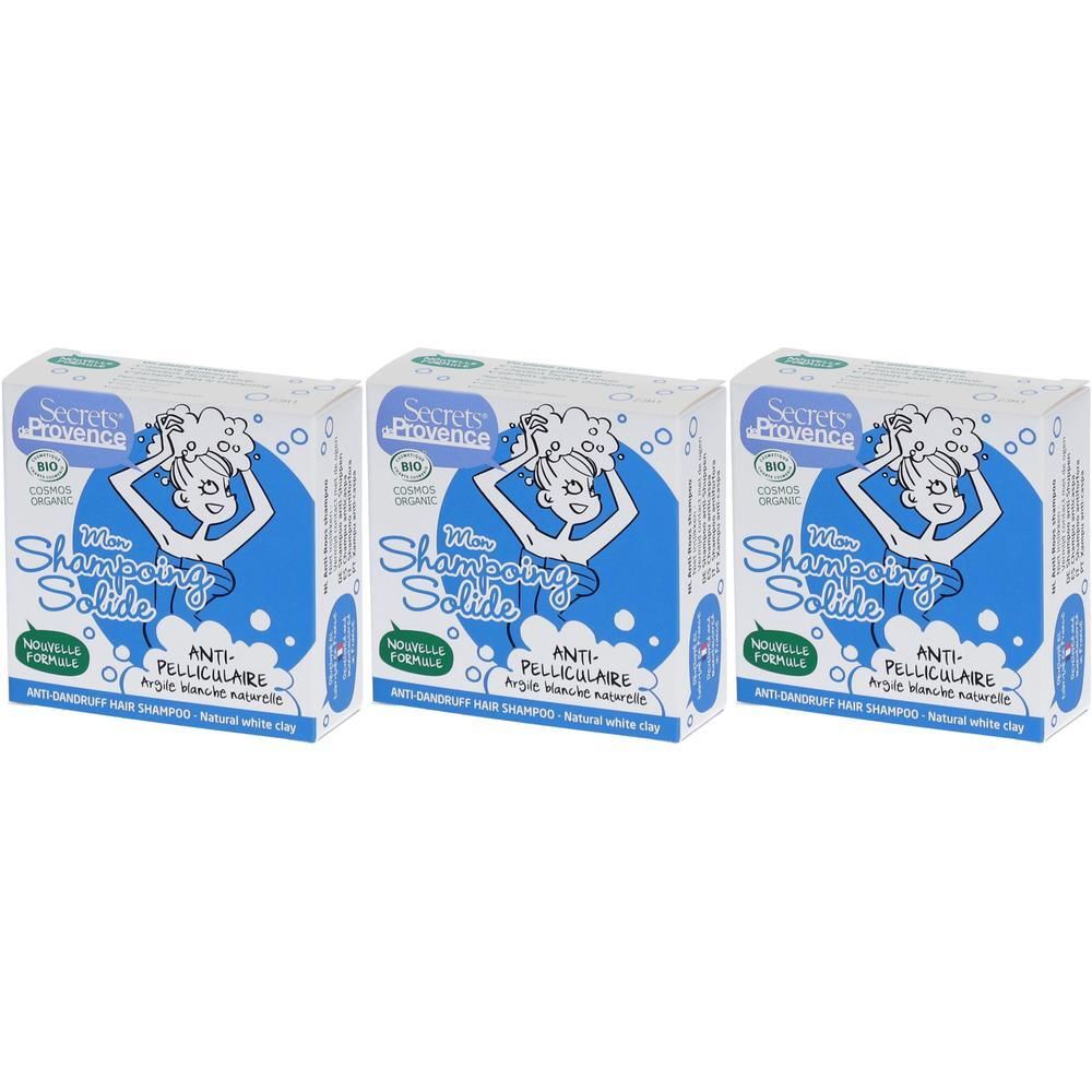 Drie doosjes vast anti-roos shampoo met illustratie van een vrouw die haar wast.