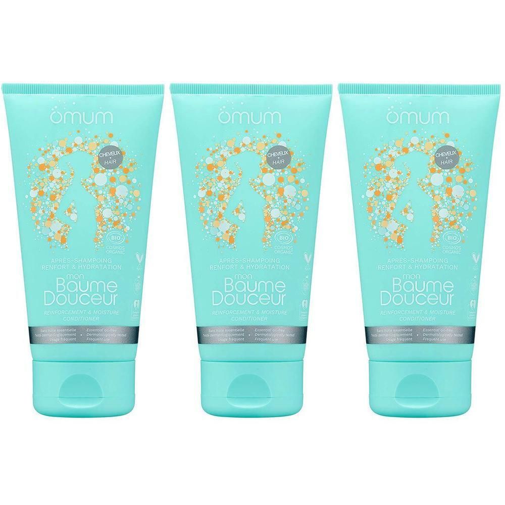 Drie turquoise tubes Omum Mon Baume Douceur Après-Shampoing.