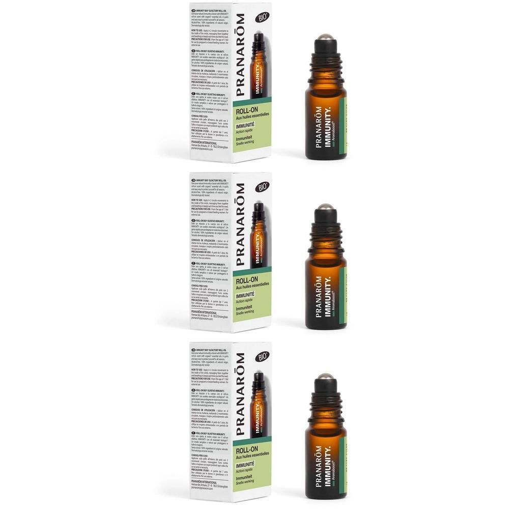 Trois flacons Pranarom Roll-on Immunity avec applicateur roll-on et flacon en verre brun.