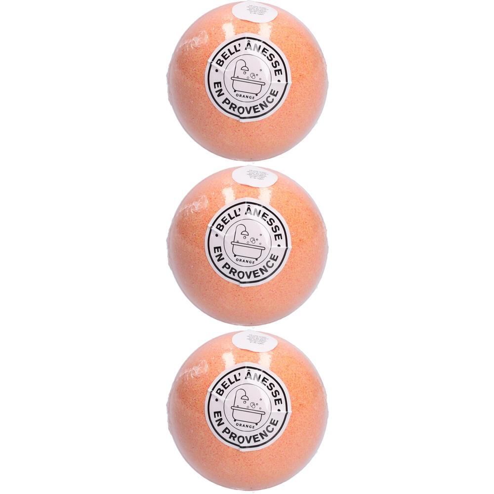 Trois boules de bain orange avec inscription orange bio.