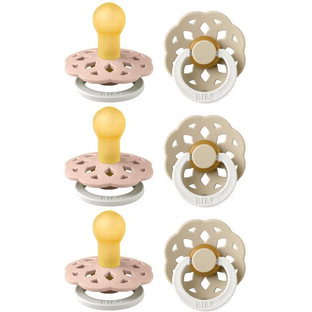 Trois suces BIBS Bohème rose et beige avec tétine jaune et anneau blanc.