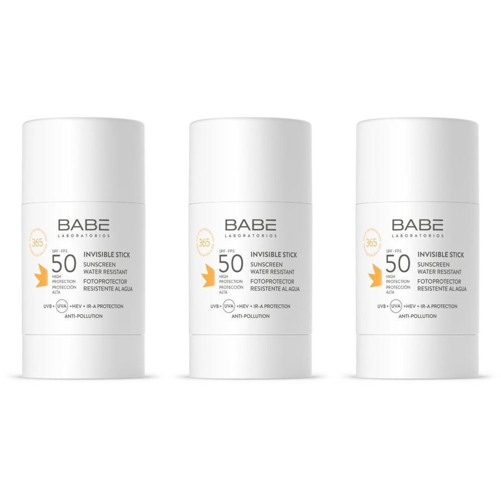Trois bâtons de protection solaire blancs SPF 50, résistants à l'eau et à la pollution.